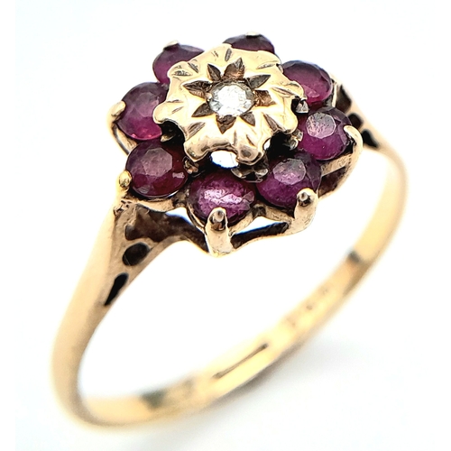 624 - A 9K YELLOW GOLD DIAMOND & RUBY CLUSTER RING. Size M, 1.7g total weight. Ref: SC 8015