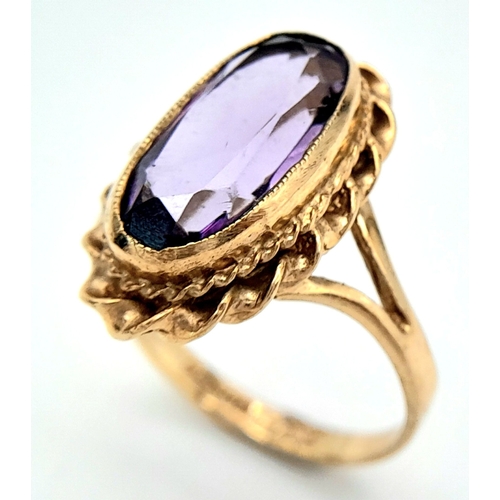 606 - A 9K YELLOW GOLD AMETHYST SET VINTAGE RING. Size P, 3.8g total weight. Ref: SC 8038