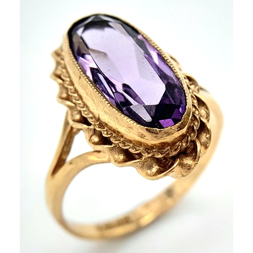 606 - A 9K YELLOW GOLD AMETHYST SET VINTAGE RING. Size P, 3.8g total weight. Ref: SC 8038