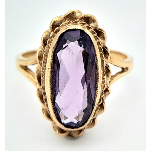 606 - A 9K YELLOW GOLD AMETHYST SET VINTAGE RING. Size P, 3.8g total weight. Ref: SC 8038