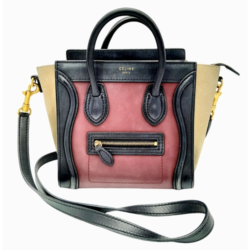 522 - A Celine Tri Colour Hand/Shoulder Bag. Burgundy and black leather exterior with soft textile sides. ... 