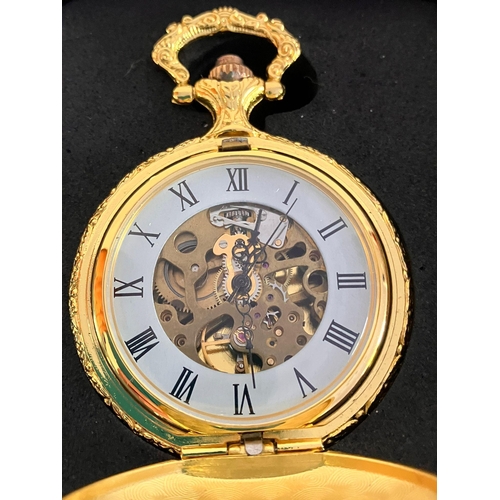 623 - Gilded SKELETON POCKET WATCH with Gilded chain.Manual winding in full working order. Condition New a... 