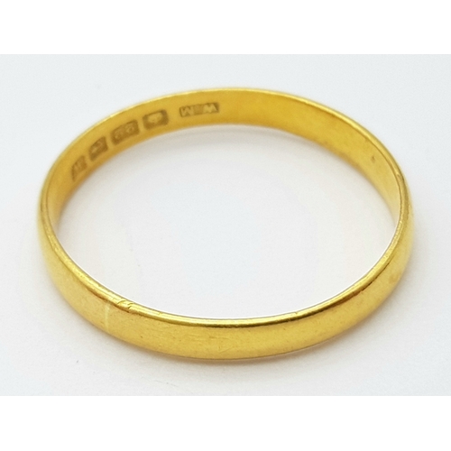 716 - A 22 K yellow gold convex band ring, size: O, weight: 2.4 g.