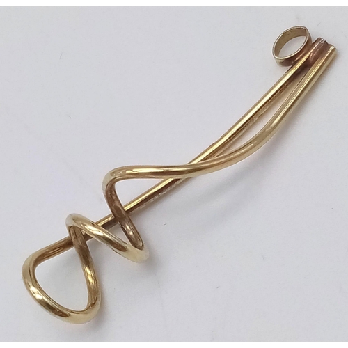 1853 - A 9K Yellow Gold Corkscrew Pendant. 4cm. 1.41g weight.