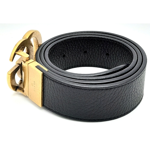 A Gucci Black Leather Belt. Classic gold tone Gucci monogram buckle ...