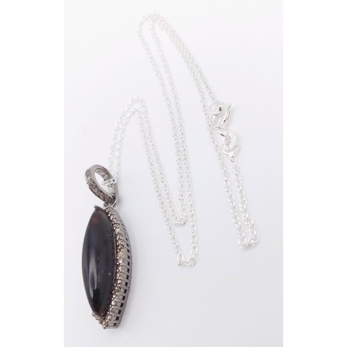 126 - A Marquise Cut Black Opal Pendant with Diamond Surround on 925 Silver and a Silver Chain. 3.75ct bla... 