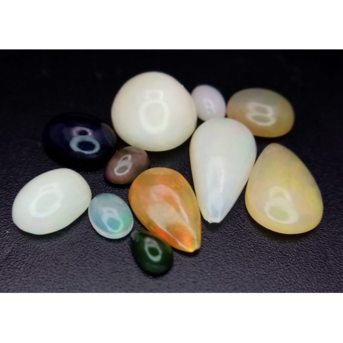 140 - An 11ctw Lot of Ethiopian Opals. 11 stones in a clip-open case.
