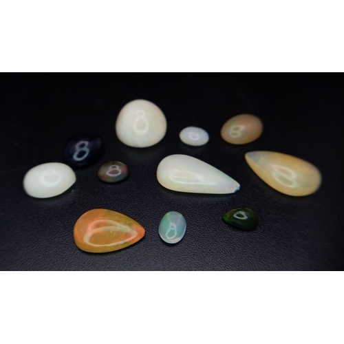 140 - An 11ctw Lot of Ethiopian Opals. 11 stones in a clip-open case.