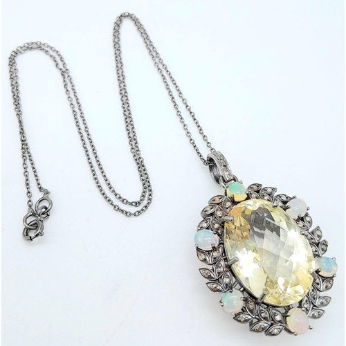 167 - A Citrine Pendant with Opal and Diamond Surround on 925 Silver Chain.22ct citrine, 1.30ctw opals, 0.... 