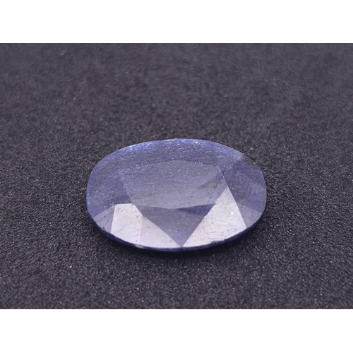 989 - A 8.55ct African Vivid Blue Natural Sapphire, with Oval Faceted cut. Comes with the AIG America Cert... 