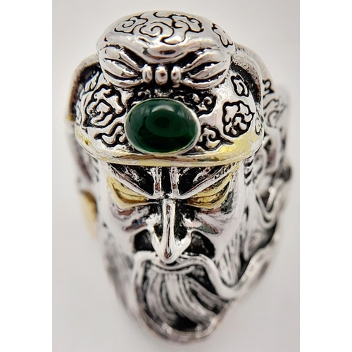 293 - white metal (untested) Chinese Guan Yu ring with a green jade cabochon. Size: adjustable, weight: 16... 