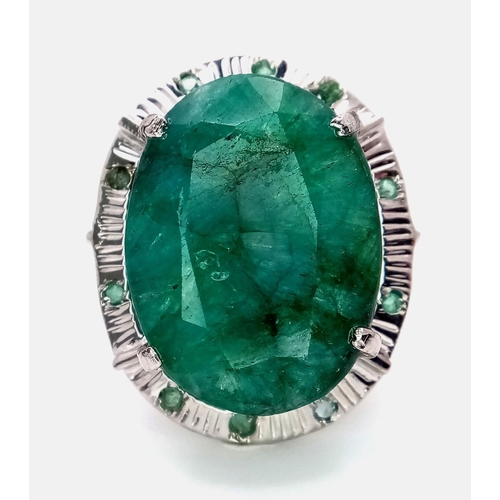 352 - A 48ct Brazilian Emerald Silver Ring. Set in 925 Sterling Silver. W- 17.5g. Comes in a presentation ... 