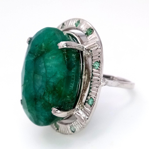 352 - A 48ct Brazilian Emerald Silver Ring. Set in 925 Sterling Silver. W- 17.5g. Comes in a presentation ... 