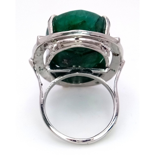 352 - A 48ct Brazilian Emerald Silver Ring. Set in 925 Sterling Silver. W- 17.5g. Comes in a presentation ... 