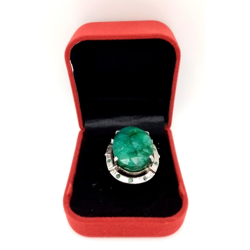 352 - A 48ct Brazilian Emerald Silver Ring. Set in 925 Sterling Silver. W- 17.5g. Comes in a presentation ... 