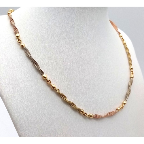 8 - A Beautiful Italian 14K Yellow and Rose Gold Twist Necklace. Ten bars of alternating coloured gold i... 