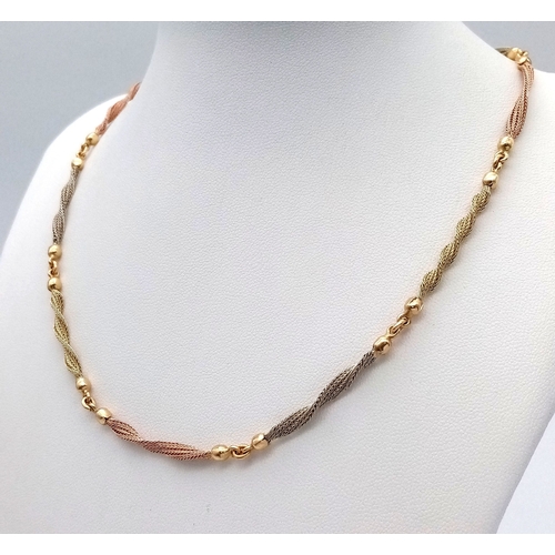 8 - A Beautiful Italian 14K Yellow and Rose Gold Twist Necklace. Ten bars of alternating coloured gold i... 