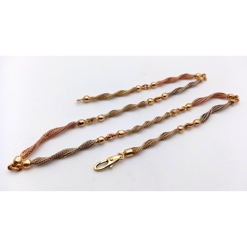 8 - A Beautiful Italian 14K Yellow and Rose Gold Twist Necklace. Ten bars of alternating coloured gold i... 