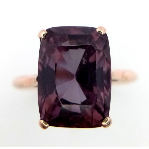 127 - An Intriguing 9K Rose Gold Blue/Purple Gemstone Colour Change Ring. Size O. 4.1g total weight.