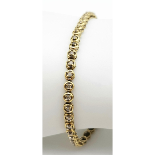 24 - A Vintage 9K Yellow Gold Diamond Tennis Bracelet. 19cm. 5.8g total weight.