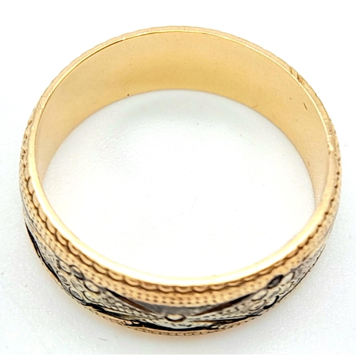 246 - A 9K Yellow and White Decorative Band Ring. 6mm width. Size J. 2.75g