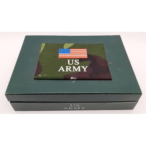 251 - A U.S.A. Army Boot Camp set (dated 2006) consisting of a watch with compass, a dog tag with chain, a... 