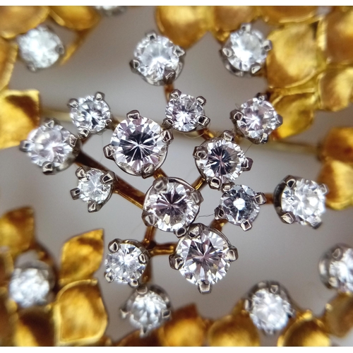 30 - A Magical 18K Yellow Gold and Diamond Brooch. 1.5ctw of brilliant round cut diamonds amongst leaves ... 