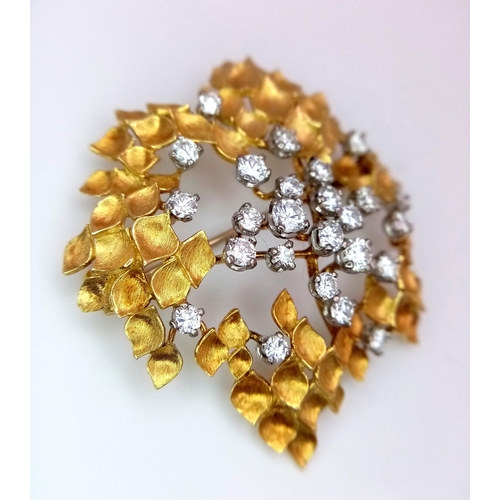 30 - A Magical 18K Yellow Gold and Diamond Brooch. 1.5ctw of brilliant round cut diamonds amongst leaves ... 