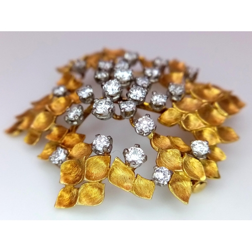 30 - A Magical 18K Yellow Gold and Diamond Brooch. 1.5ctw of brilliant round cut diamonds amongst leaves ... 