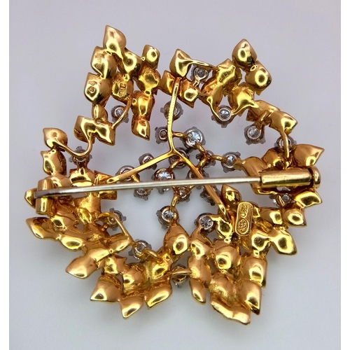 30 - A Magical 18K Yellow Gold and Diamond Brooch. 1.5ctw of brilliant round cut diamonds amongst leaves ... 