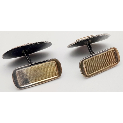 36 - Silver and Gold Waffen SS Cuff Links.