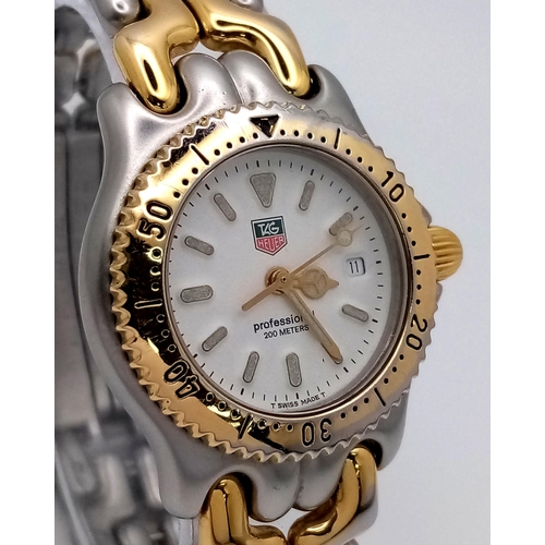 400 - A Tag Heuer (1990s) Professional Quartz Ladies Watch. Two tone bracelet and case - 34mm. White dial ... 