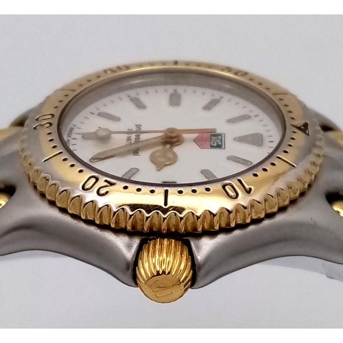 400 - A Tag Heuer (1990s) Professional Quartz Ladies Watch. Two tone bracelet and case - 34mm. White dial ... 