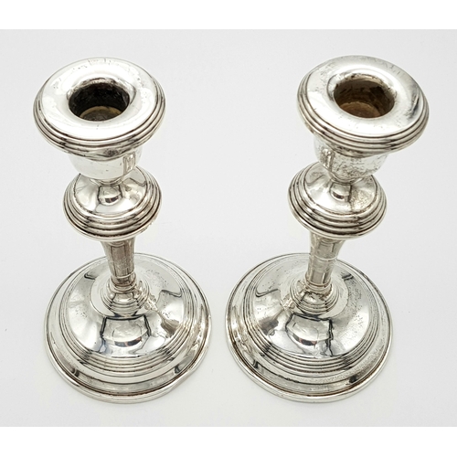 407 - A Pair of Vintage Mid-Size Candlestick Holders. 18cm tall. Birmingham hallmarks for 1961. Weighted a... 