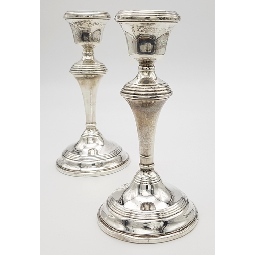 407 - A Pair of Vintage Mid-Size Candlestick Holders. 18cm tall. Birmingham hallmarks for 1961. Weighted a... 