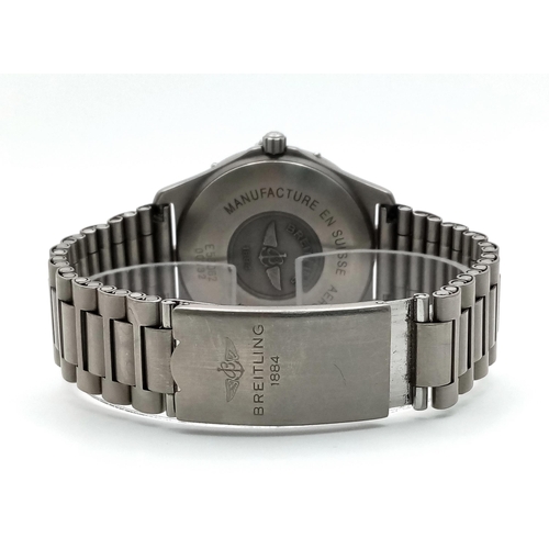 418 - A Breitling E56062 Aerospace Quartz Pilots Watch. Titanium bracelet and case - 40mm. Blue dial with ... 