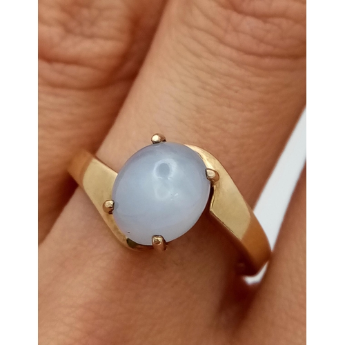 45 - A Gorgeous 9K Yellow Gold Moonstone Cabochon Crossover Ring. Size P. 3.5g total weight.