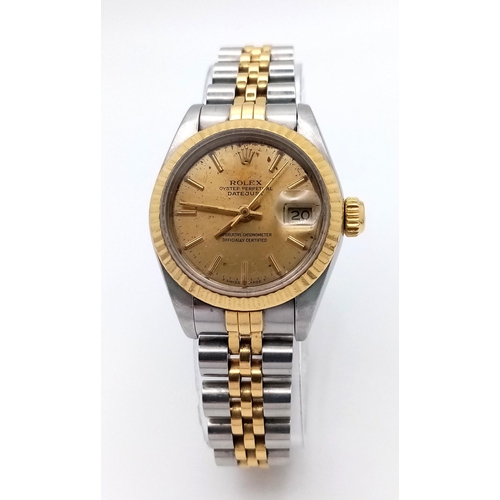 47 - A Bi-Metal Rolex Oyster Perpetual Datejust Ladies Watch. 18K gold bracelet and case - 26mm. NOTE: Th... 