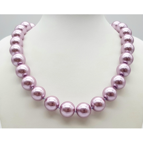 488 - An Exotic Lavender South Sea Pearl Shell Beaded Necklace. 14mm beads. 44cm necklace length