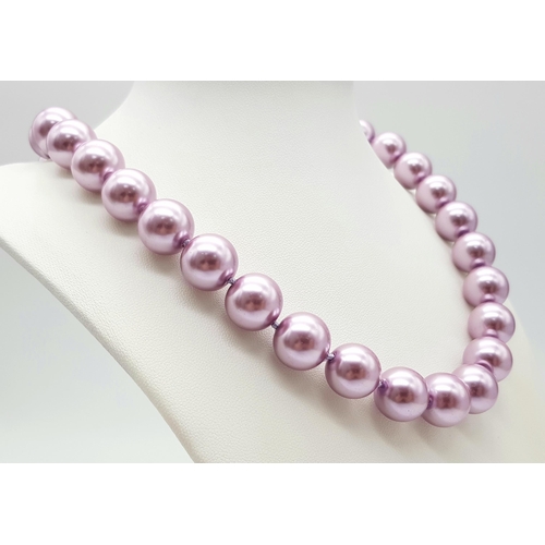 488 - An Exotic Lavender South Sea Pearl Shell Beaded Necklace. 14mm beads. 44cm necklace length