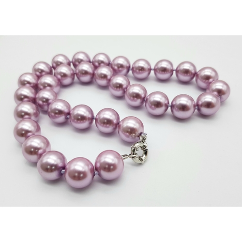 488 - An Exotic Lavender South Sea Pearl Shell Beaded Necklace. 14mm beads. 44cm necklace length