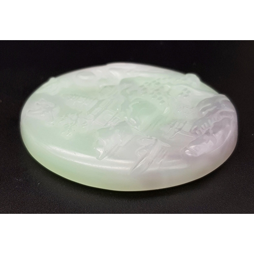 540 - A Chinese Pale Green and White Jade Circular Pendant with Village Decoration. 5cm diameter.