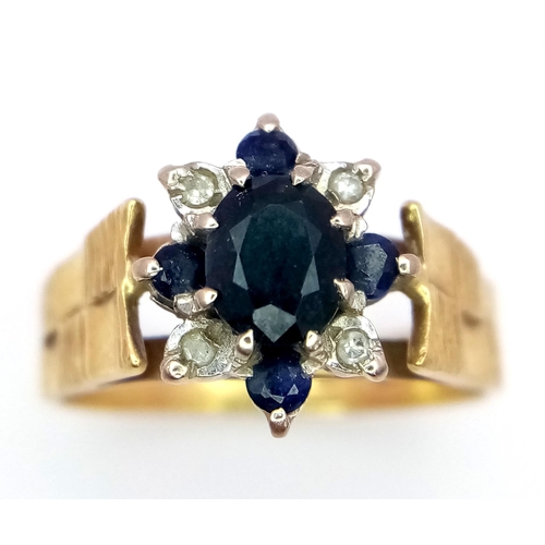 563 - A Vintage 9K Yellow Gold Sapphire and Diamond Signet Ring. 
Size J 1/2. 4.4g total weight.