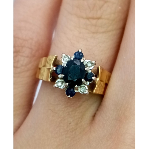 563 - A Vintage 9K Yellow Gold Sapphire and Diamond Signet Ring. 
Size J 1/2. 4.4g total weight.