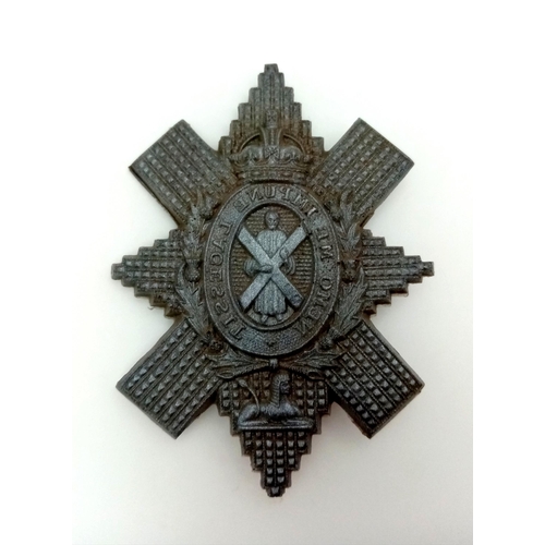 568 - WW2 Plastic (Cellulose Acetate) Economy Black Watch Cap Badge.