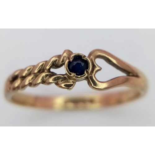 580 - A 9K Yellow Gold and Sapphire Love Ring. Size J. 1.1g weight.