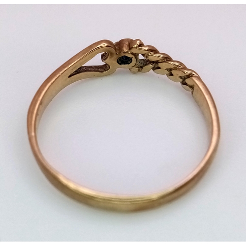 580 - A 9K Yellow Gold and Sapphire Love Ring. Size J. 1.1g weight.