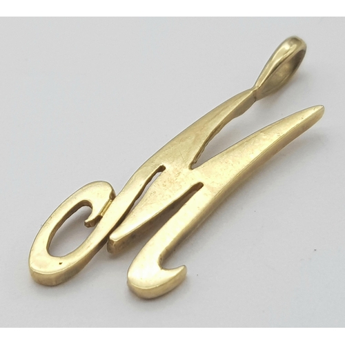 582 - A Vintage 9K Yellow Gold 'M' Pendant. 3cm. 1.4g