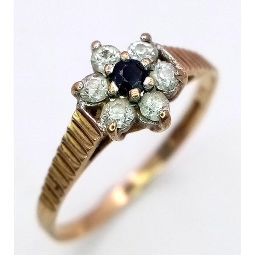 584 - A Vintage 9K Yellow Gold Sapphire and White Zircon Ring. Size L. 1.2g total weight.