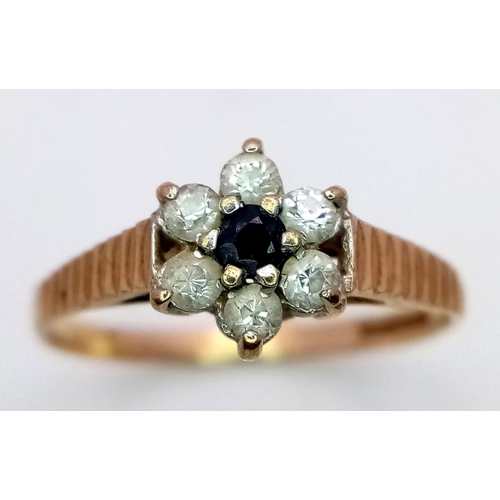 584 - A Vintage 9K Yellow Gold Sapphire and White Zircon Ring. Size L. 1.2g total weight.